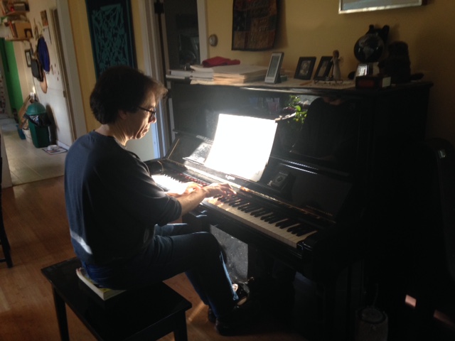 Me playing Chopin with a sunbeam on the music